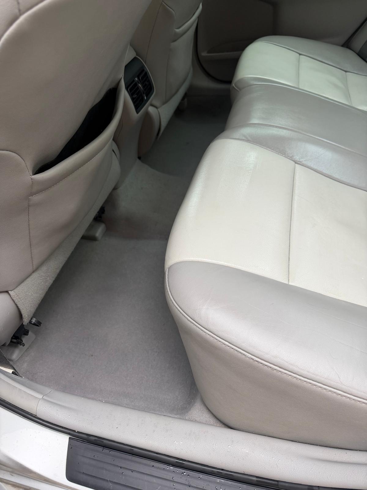 Clean rear carpet and seat after detailing